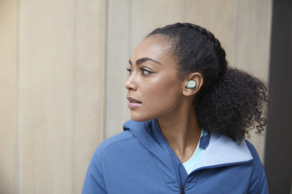 Jabra Elite 7 Active Mint Lifestyle Side Profile Blue Jacket Medium